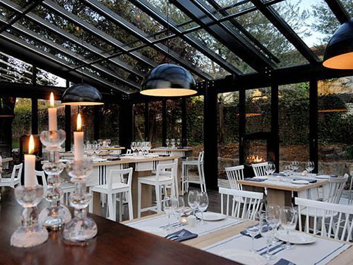 cabaña marconi, comedor al anochecer Cabaña Marconi, comedor al anochecer