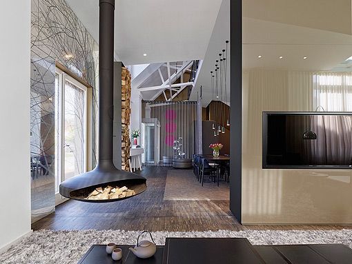 Chimenea en loft moderno de dos plantas Chimenea en loft moderno de dos plantas