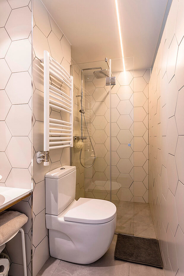 Baño de un piso reformado por Dimensi-on Arquitectura Interior