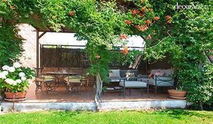 salon-y-comedor-de-verano-bajo-la-pergola.jpg