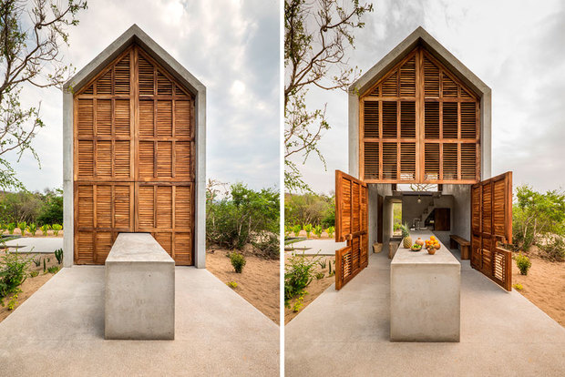 Una pequeña casa de cemento en medio de la selva