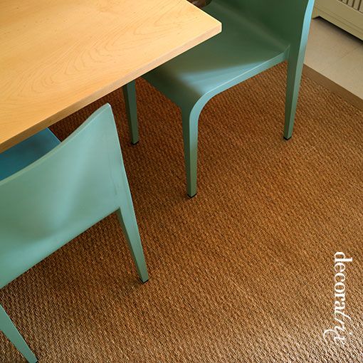 Alfombra delimitando la zona de comedor
