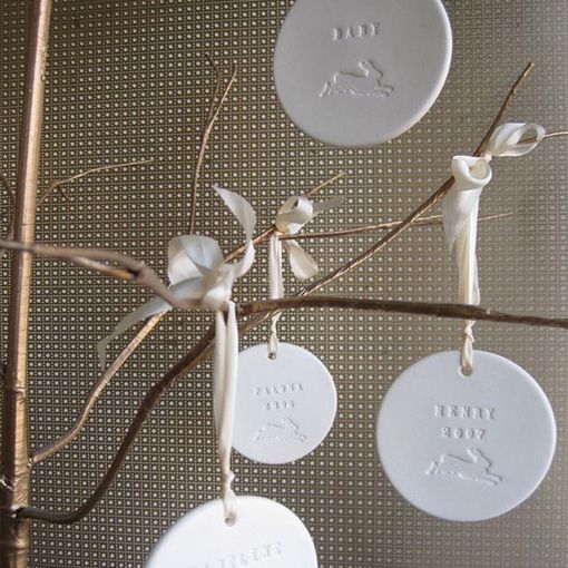 medallas-bebe-palomas-nest