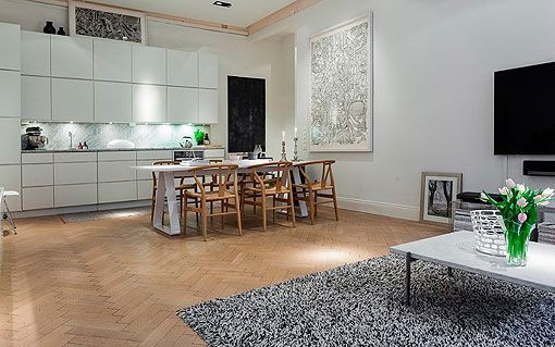 Apartamento moderno y elegante al estilo nórdico: cocina integrada en el salón