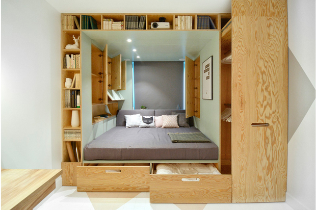 Habitación juvenil modular en 14 m2 en una caja de madera con armarios
