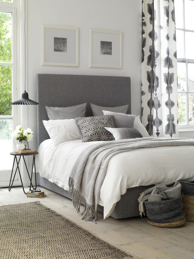 Dormitorio en tonos blancos y grises