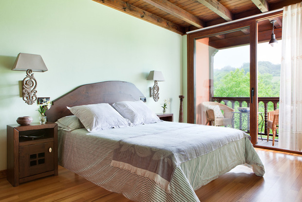 Viviendas rurales en Asturias Las casitas del Viajero: dormitorio verde de la Casita Delfa