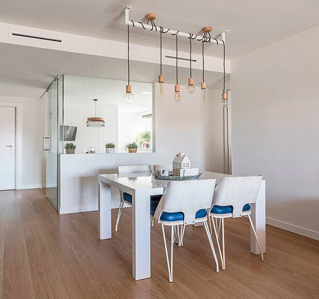 Comedor de un piso reformado por Dimensi-on Arquitectura Interior